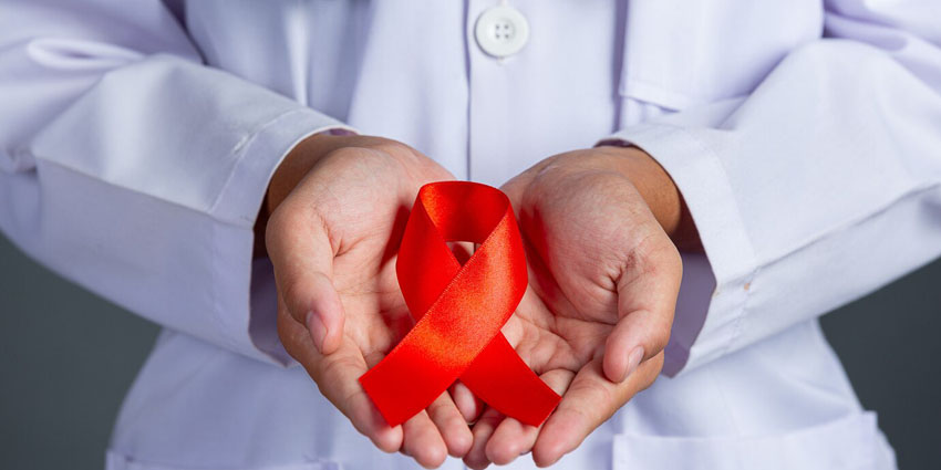 doctor-holds-red-ribbon-hiv-awareness-awareness-world-aids-day-world-sexual-health-day_1150-24400